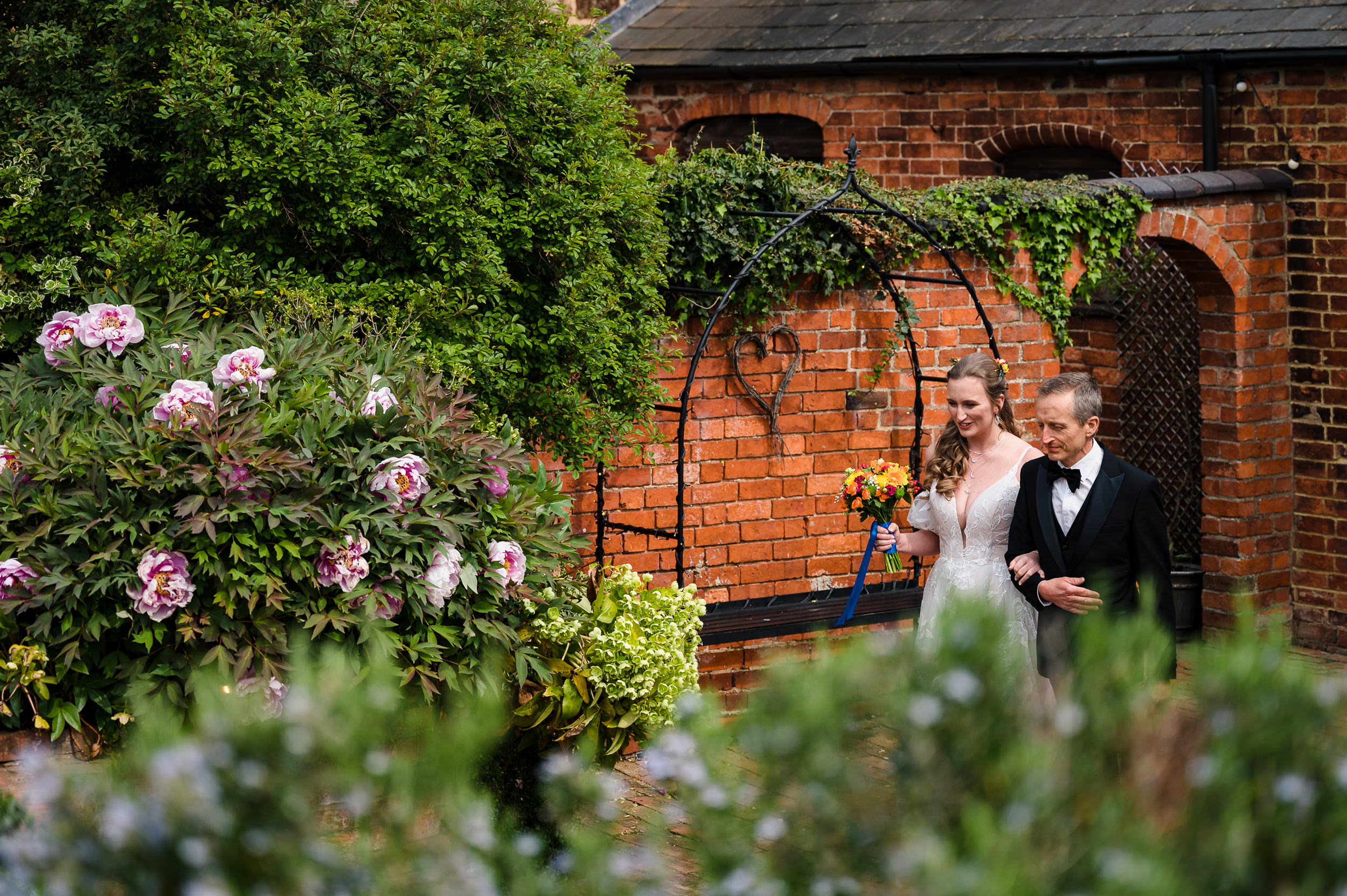 bride and her dad walking down the aisle at dodmoor house wedding
