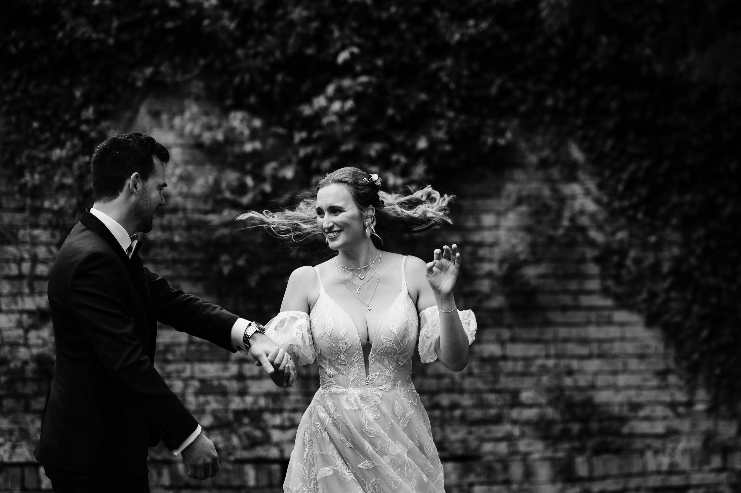 Bride and groom dancing in the gardens at dodmoor house