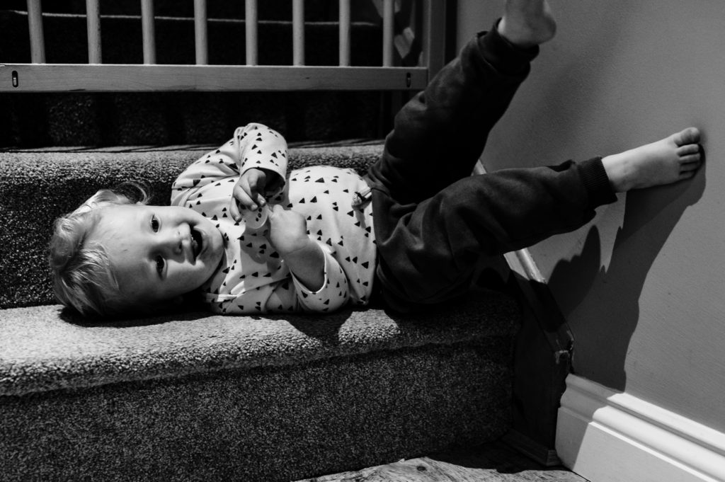boy playing on the stairs