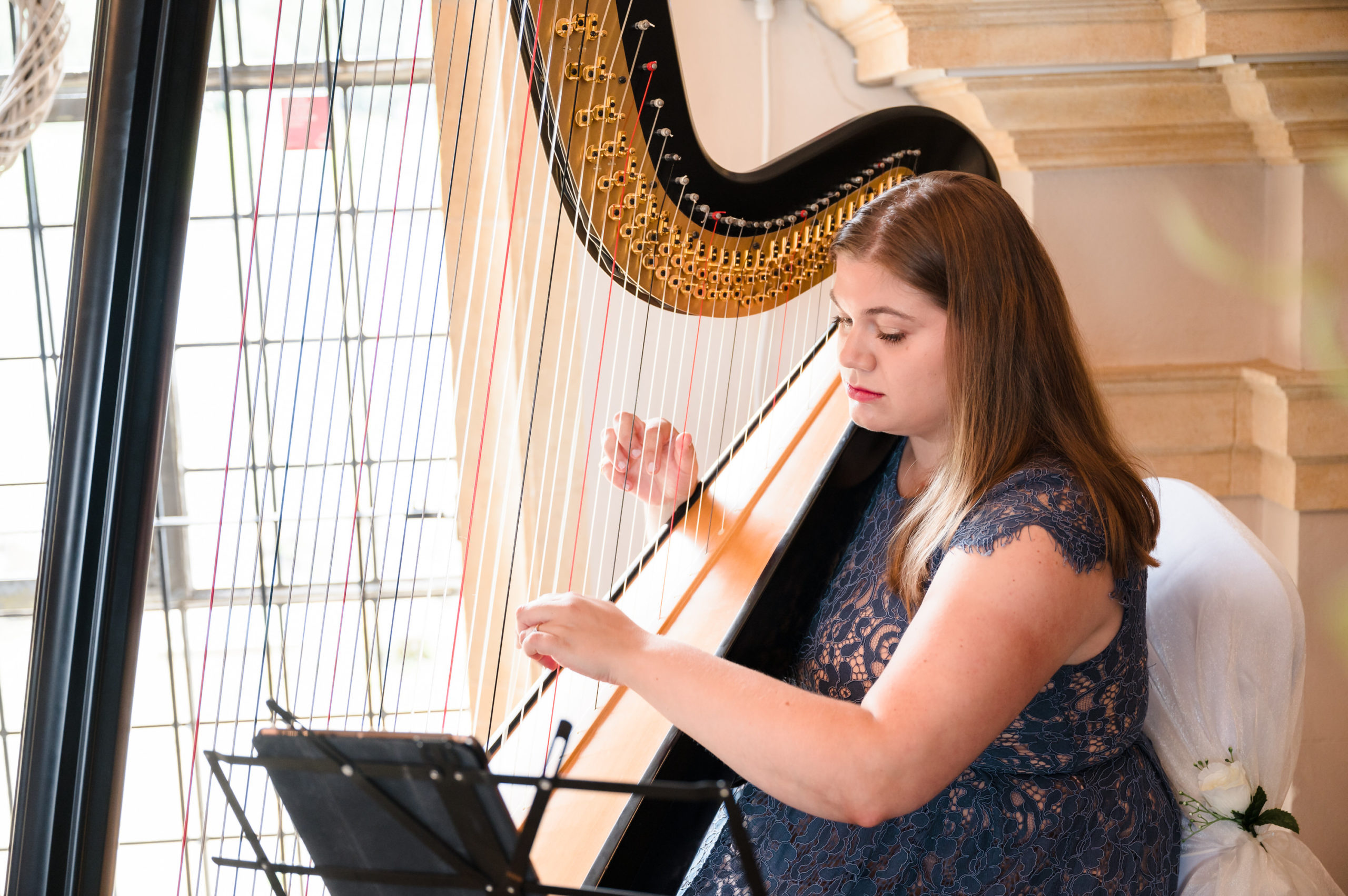 Harriet Flather Harpist playing at Normanton church rutland