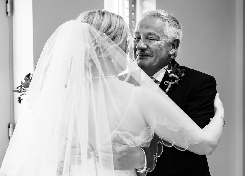 brides dad seeing her for the first time on her wedding day