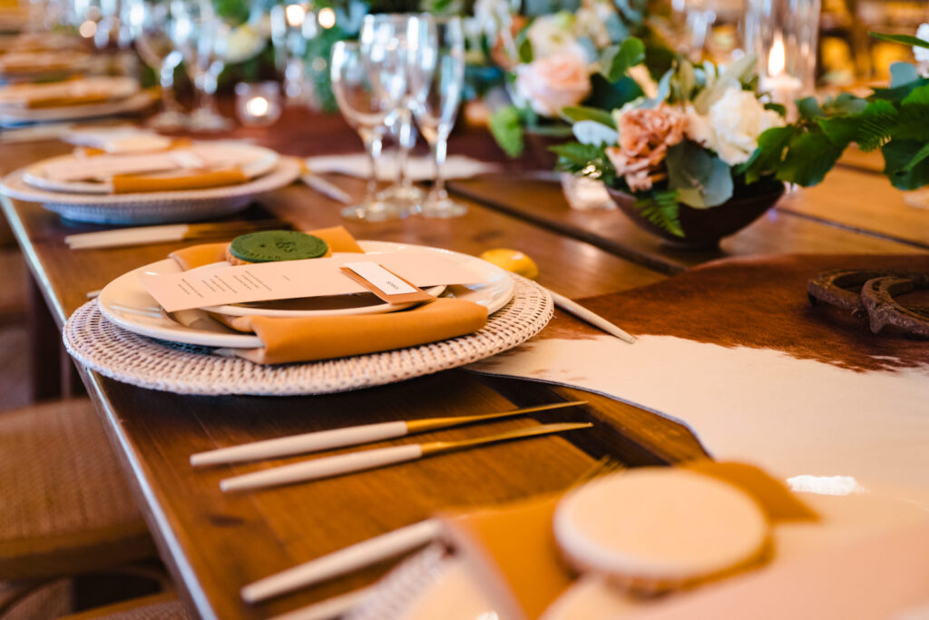 table setting at dibbins wood with biscuits, menues and cowboy styling
