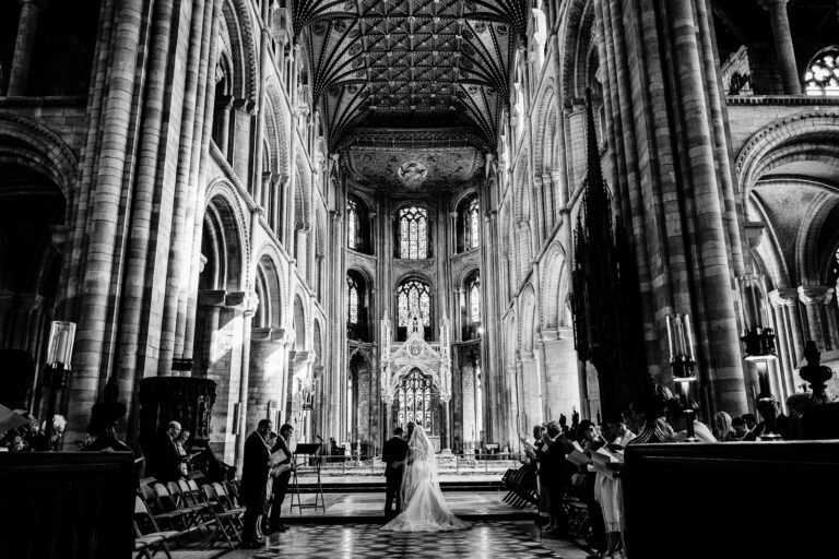 Photo of wedding ceremony at peterborough cathedral in black and white